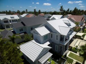 Aerial view of energy-efficient roofs on residential homes in Simi Valley, showcasing modern roofing designs and materials.