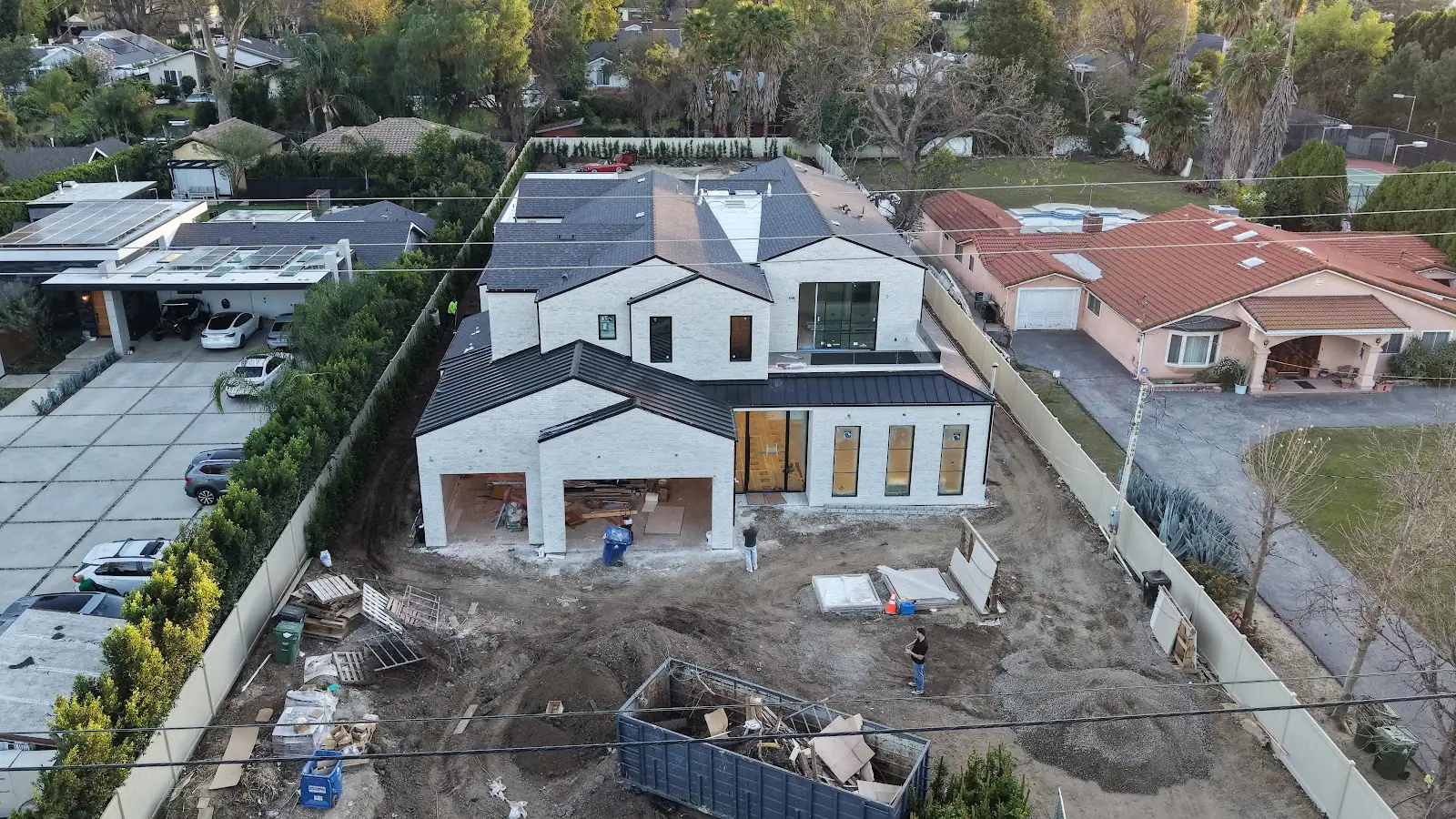 New roof on a newly built two-story home, seen from a drone