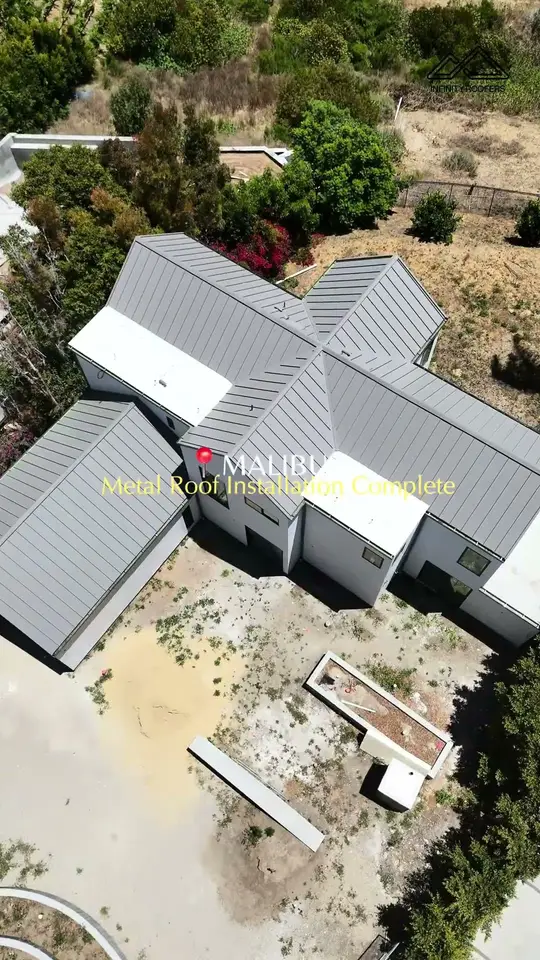 Drone view of a finished metal roof in Malibu